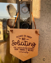 Snarky "No Soliciting" signs