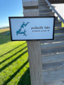 Smithville longitude sign